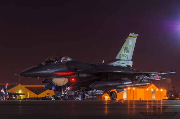 A Lockheed-Martin Block 52 F-16CJ from the 16th Weapons Squadron prepares to launch for a night sortie at Nellis AFB, NV