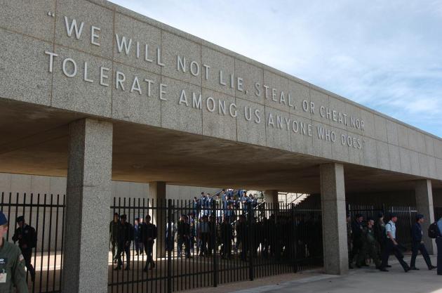 Cadets at the U.S Air Force Academy in Colorado Springs, Colo., exit classes under a wall with the Cadet Honor Code: "We will not lie, steal or cheat, nor tolerate among us anyone who does." (U.S. Air Force photo/1st Lt John Ross)