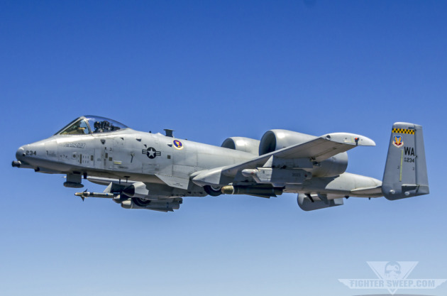 A Republic A-10C Thunderbolt II from the 66th Weapons Squadron waits for his wingman to get fuel before returning to the fight during a U.S. Air Force Weapons School training mission.