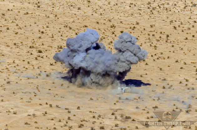 A 500-pound bomb impacts a structure at Fort Irwin, CA during a Green Flag-West exercise.