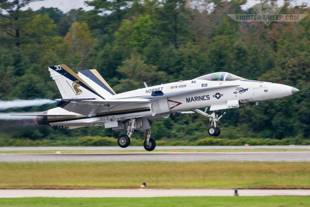 A Legacy F/A-18C Hornet from VFA-106 "Gladiators" in a stunning celebratory "30 Years of Hornet" paint scheme simulates a bolter while performing at the NAS Oceana Airshow