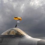 Picture of the Day: Army Golden Knights Drops in on an Air Force F-22 Raptor