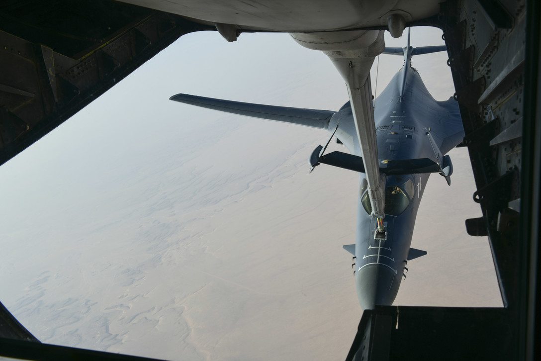Air Force B-1B Lancer bomber separates from the boom pod after receiving fuel from a KC-10 Extender
