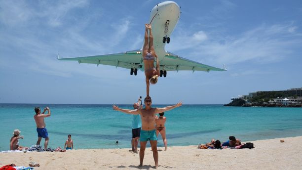 Acrobatic Couple Criticized For Stunt Under Landing Airliner