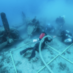 Watch: Divers work to recover bodies of lost WWII bomber crew